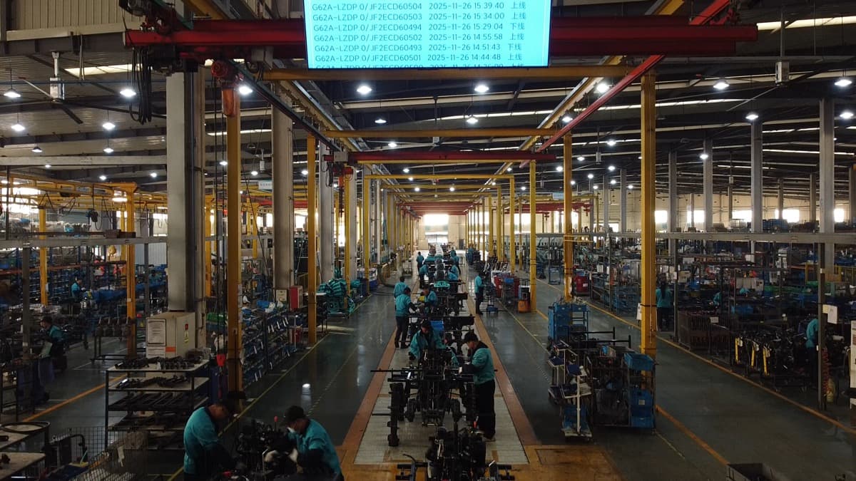 JOFAE production line with workers assembling machines